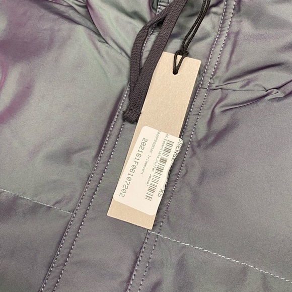 New with tags Fear of God Essentials iridescent puffer jacket men’s small - Picture 3 of 5